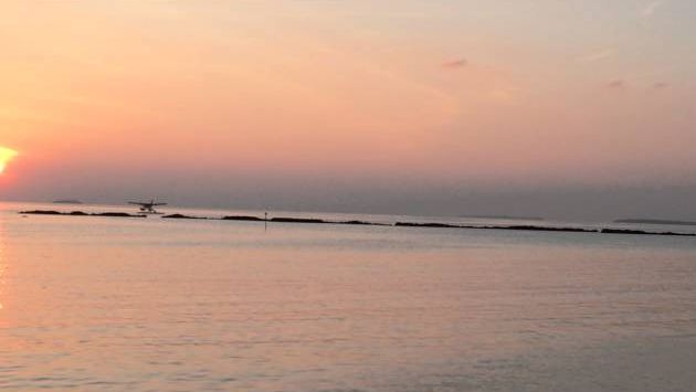 Ноябрь: Sea Plane Plane landing at Sunset Iru Fushi Maldives Resort November 2013